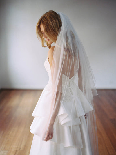The Samantha Wynne Stacey Veil is a beautiful soft English two-tiered tulle veil. 