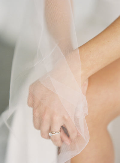 Float down the aisle in our soft English tulle Intermediate veil. 