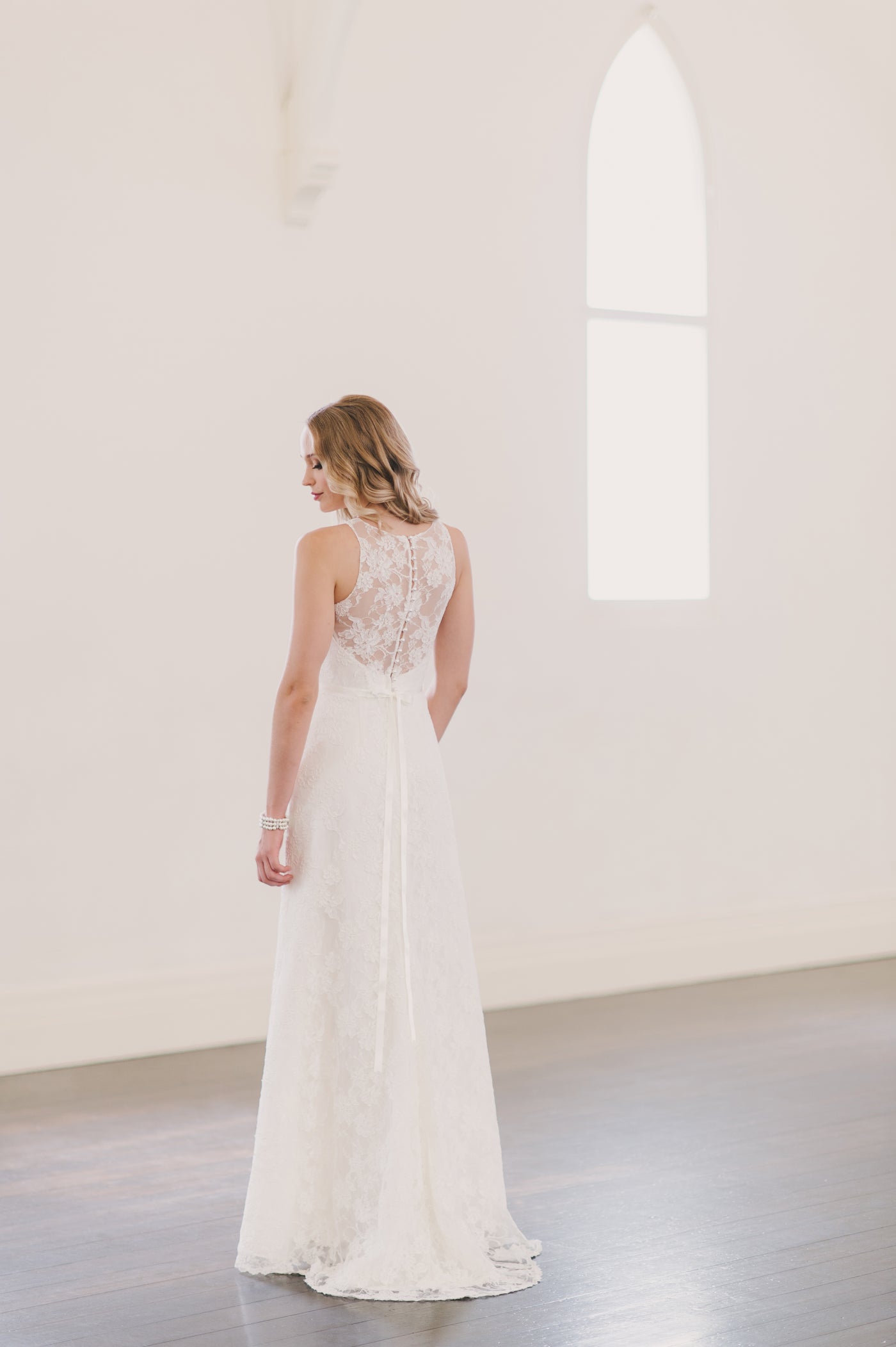 Simple A line wedding dress with a sweetheart neckline.